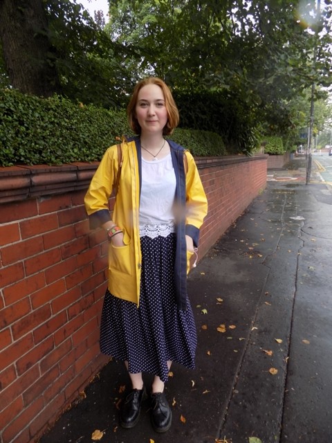 Miranda pairs culottes with a chic yellow raincoat which screams practicality in those summer showers.
