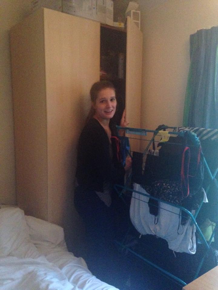 Will she ever reach her clothes?