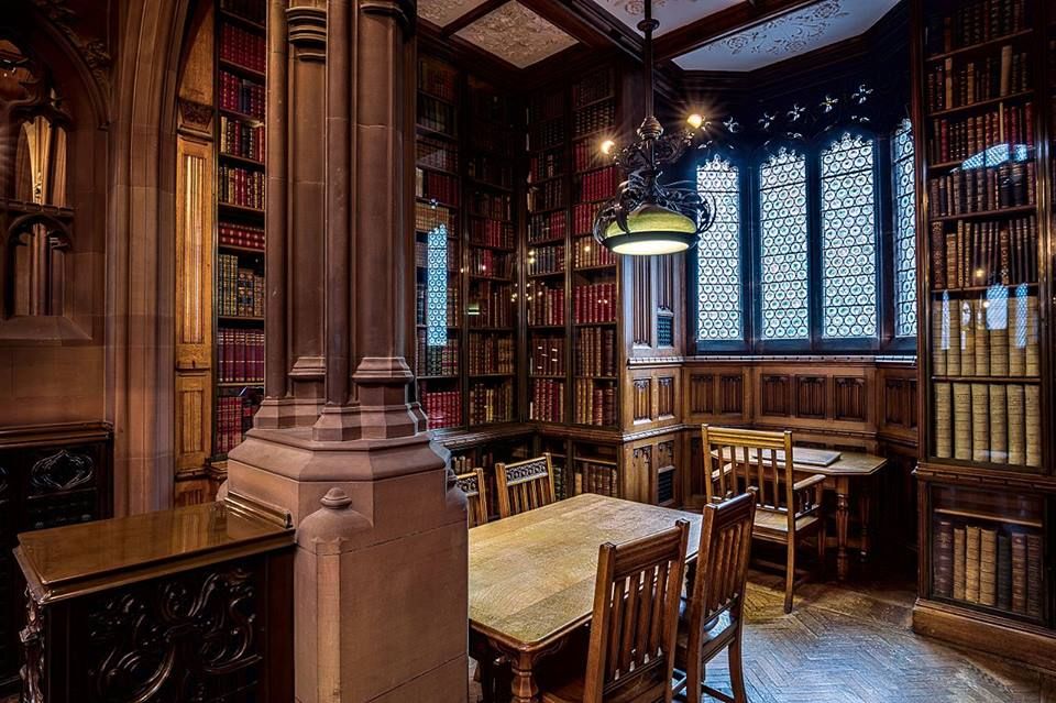 Image may contain: Food Court, Cafeteria, Cafe, Table, Dining Table, Pub, Bar Counter, Bench, Shelf, Furniture, Bookcase, Book