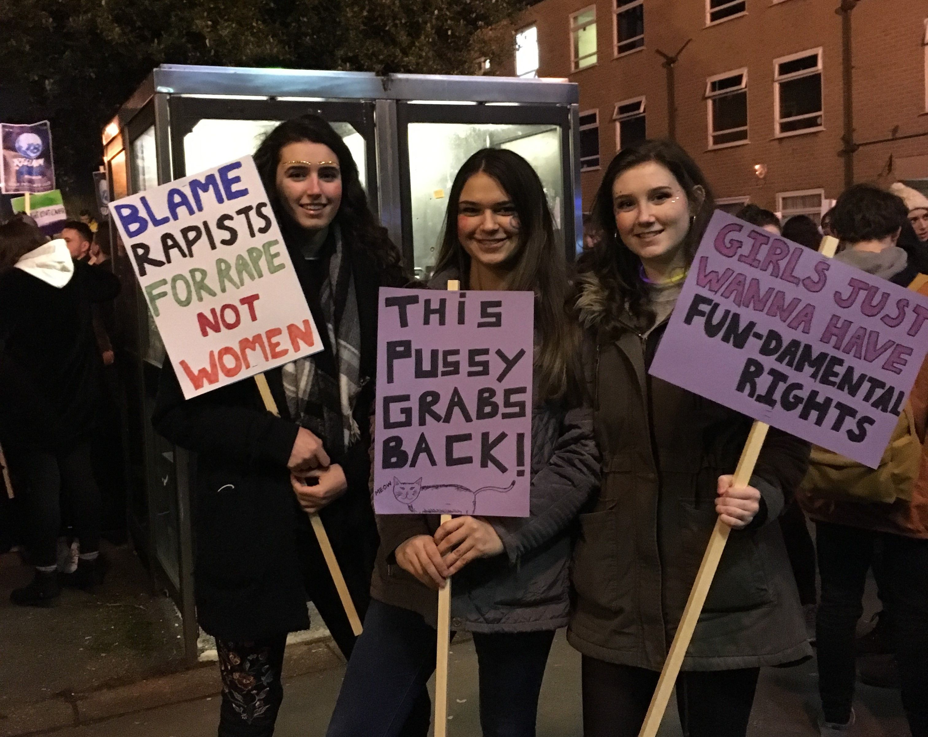 Image may contain: Suit, Overcoat, Coat, Clothing, Apparel, People, Person, Parade, Human, Crowd