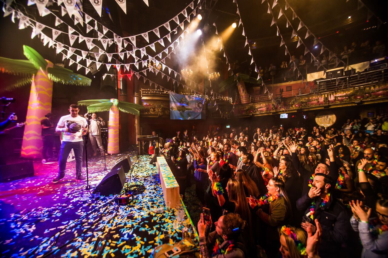 Image may contain: Party, Paper, Confetti, Music, Leisure Activities, Crowd, Person, People, Human