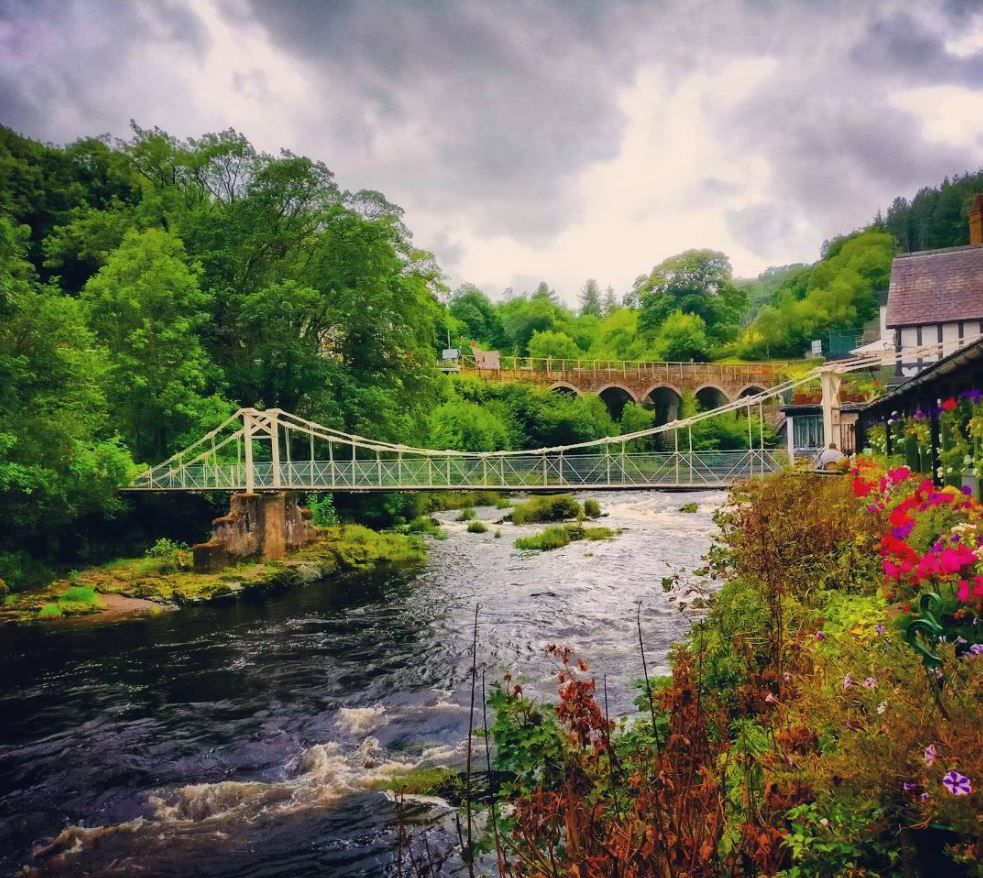 Image may contain: Outdoors, Garden, Building, Bridge