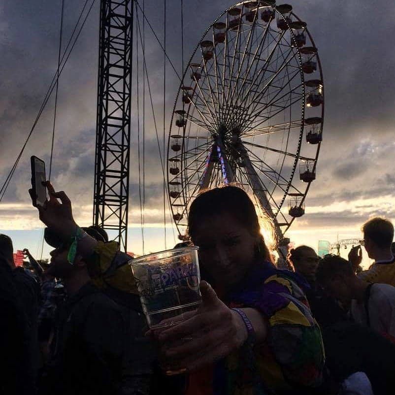 Image may contain: Make Out, Leisure Activities, Ferris Wheel, Crowd, Amusement Park, Person, People, Human