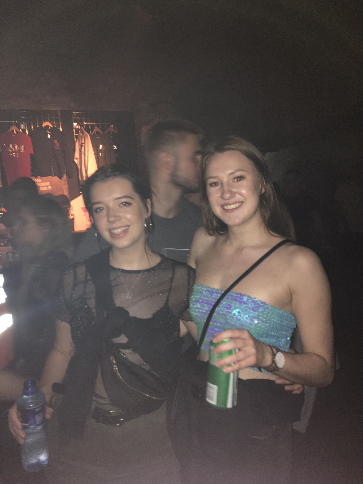 Image may contain: Smile, Portrait, Face, Night Life, Night Club, Club, Person, People, Human