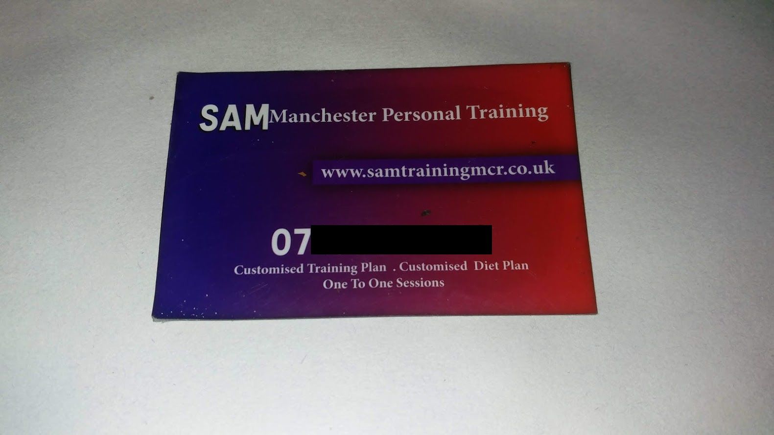 Image may contain: Text, Paper, Business Card