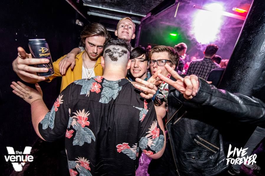 Image may contain: Drink, Beverage, Beer, Alcohol, Leisure Activities, Night Life, Night Club, Club, Party, Person, Human, Skin