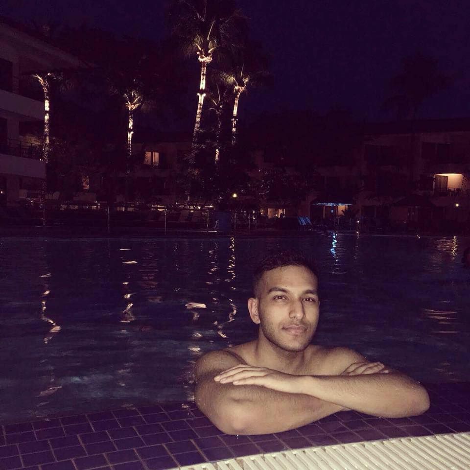 Image may contain: Face, Swimming Pool, Night Life, Pool, Resort, Building, Hotel, Water, Person, Human