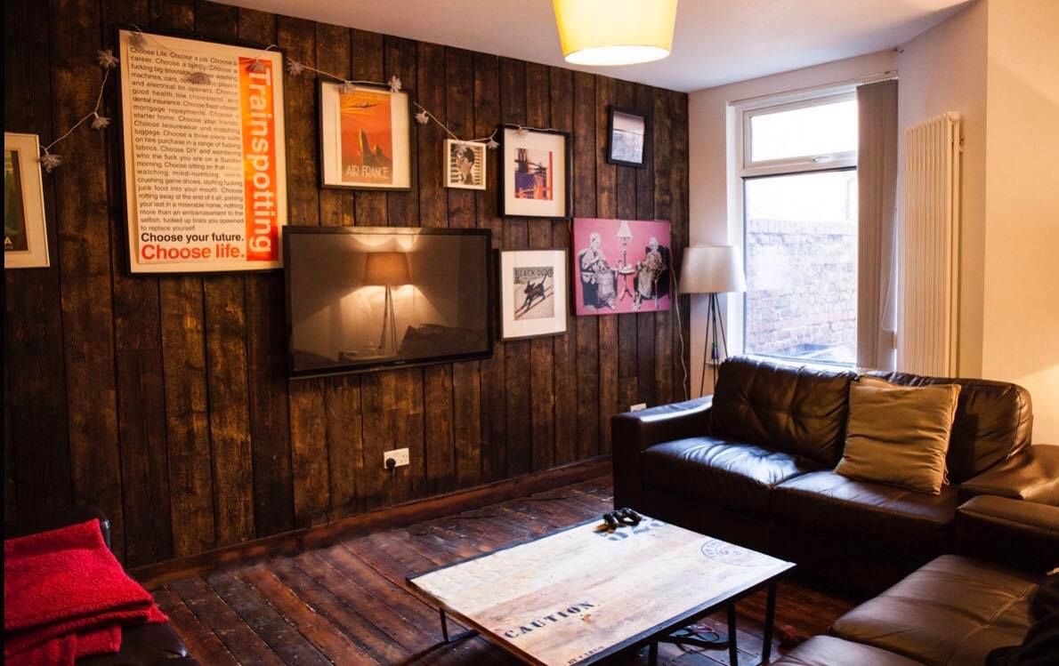 Image may contain: Flooring, Rug, Hardwood, Coffee Table, Screen, Electronics, Monitor, Display, Interior Design, Table, Building, Housing, Wood, Room, Living Room, Indoors, Furniture, Couch