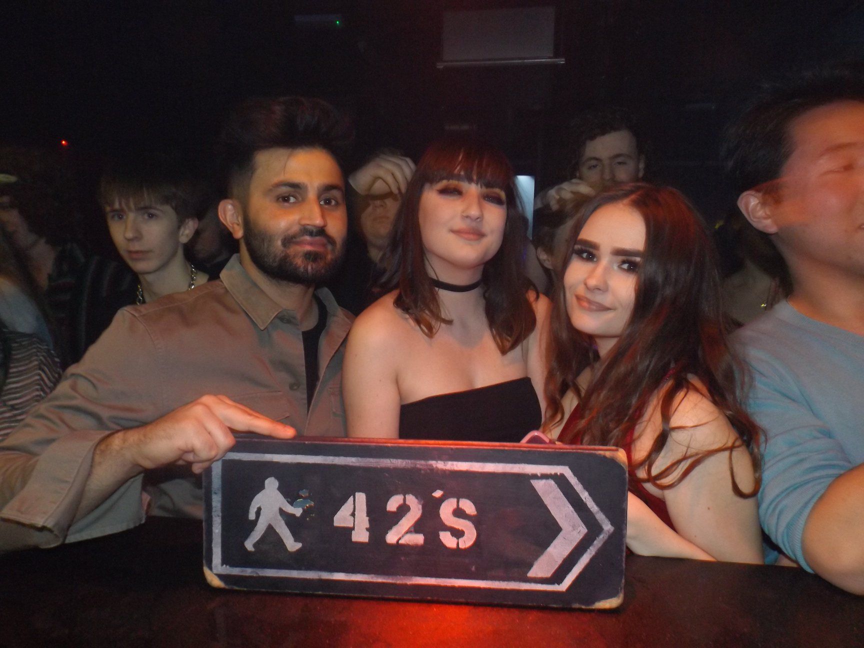 Image may contain: Night Club, Pub, Bar Counter, Face, Interior Design, Indoors, Club, Night Life, Human, Person