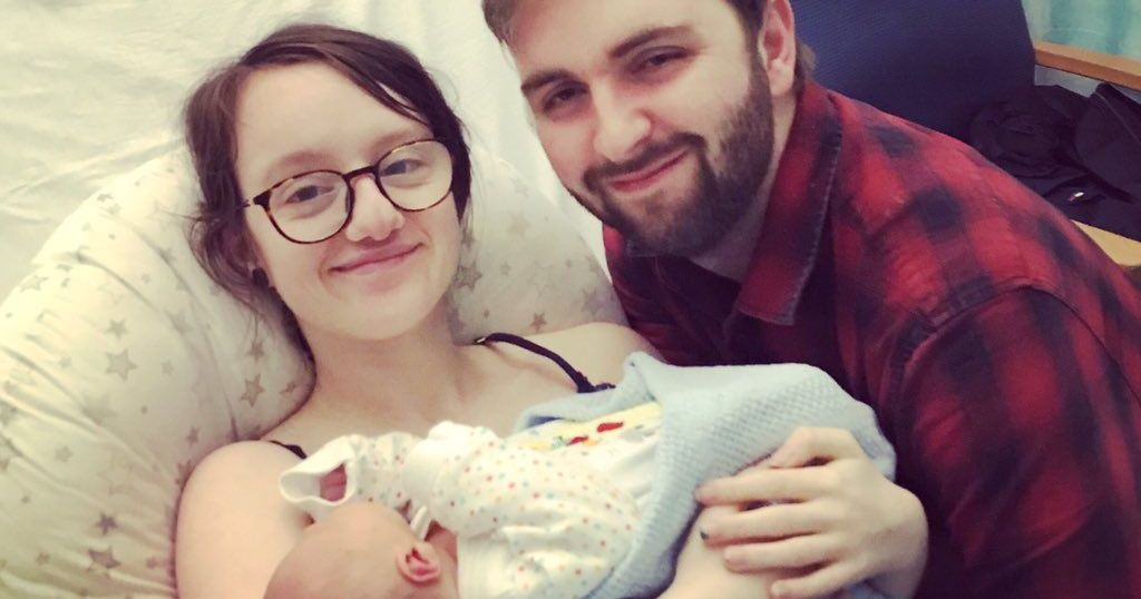 Image may contain: Woman, Portrait, Photo, Photography, Cushion, Pillow, Female, Face, Glasses, Accessories, Accessory, Human, Newborn, Baby, Person