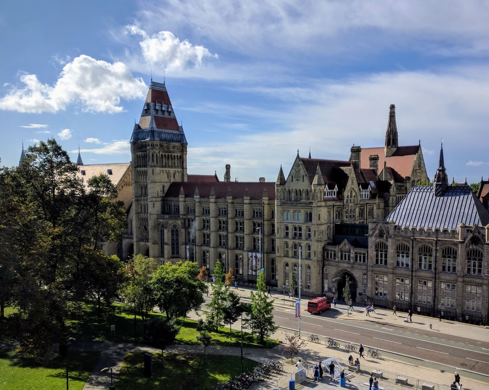 Image may contain: Landscape, Town Square, Plaza, Nature, Intersection, Outdoors, Tower, Spire, Steeple, Road, Human, Person, Metropolis, Architecture, Urban, Building, Downtown, Town, City