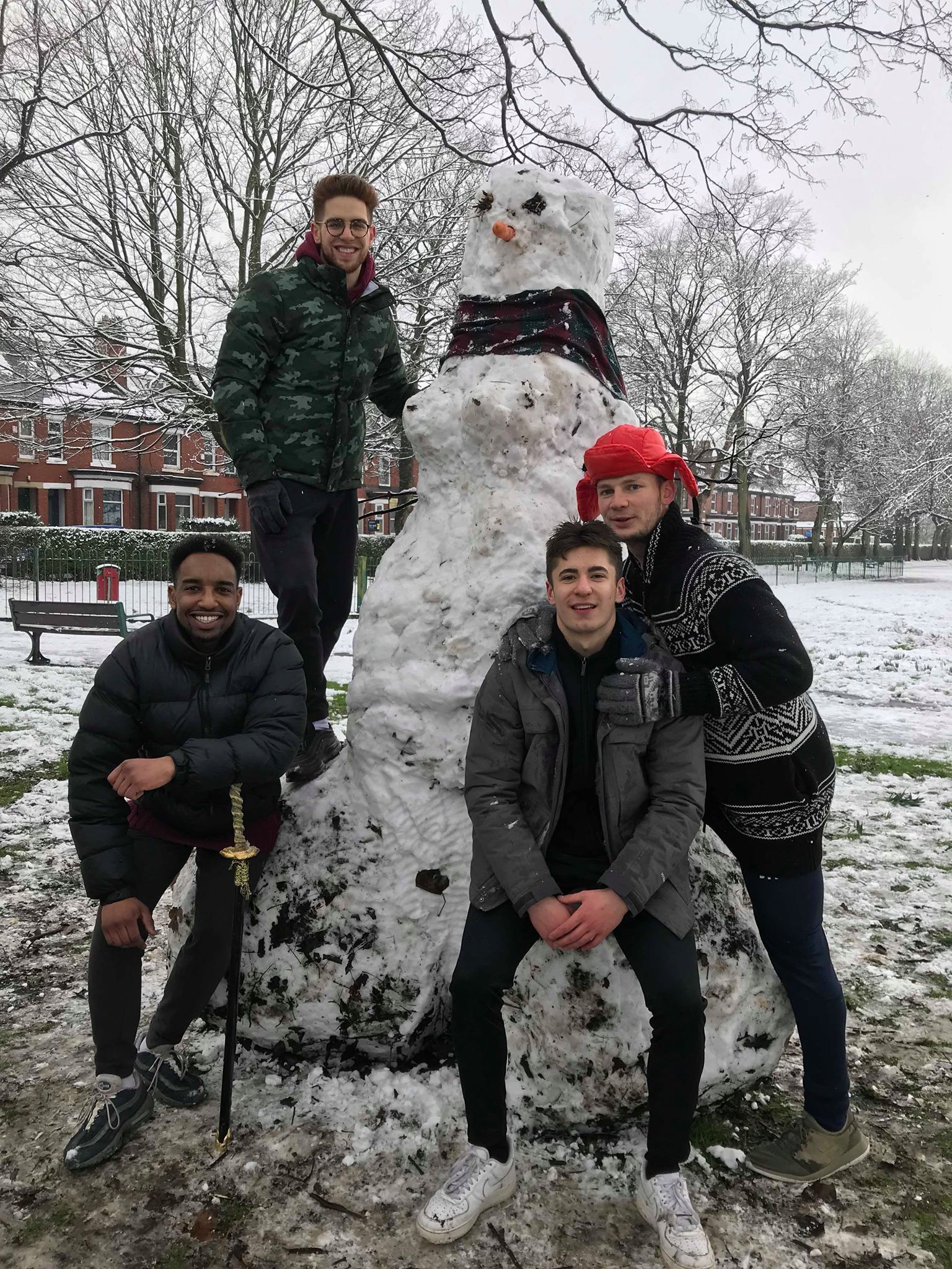 Image may contain: Snowman, Winter, Footwear, Clothing, Apparel, Shoe, Snow, Human, Person, Outdoors, Nature