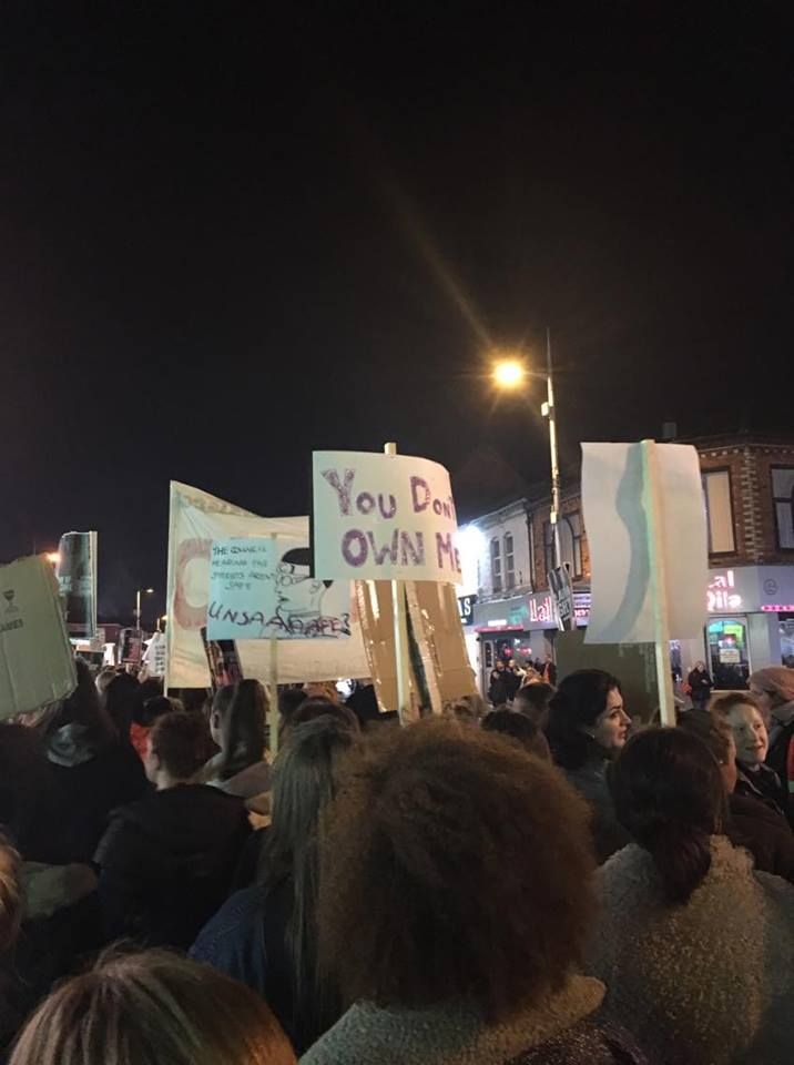 Image may contain: Audience, Protest, Parade, Text, Crowd, Human, Person