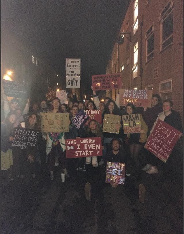 Image may contain: People, Vigil, Protest, Parade, Crowd, Banner, Text, Human, Person