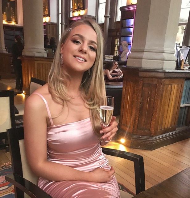Image may contain: Dining Table, Table, Room, Robe, Fashion, Gown, Evening Dress, Bar Counter, Pub, Apparel, Clothing, Interior Design, Indoors, Hardwood, Chair, Furniture, Wood, Human, Person