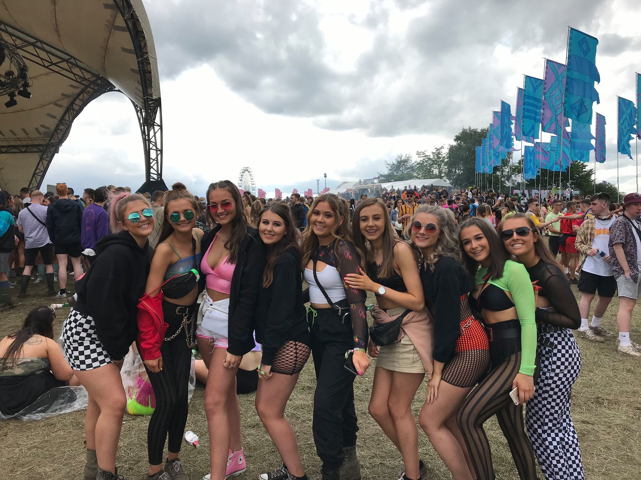 Image may contain: Festival, Crowd, Accessory, Sunglasses, Accessories, Clothing, Shorts, Apparel, Person, Human