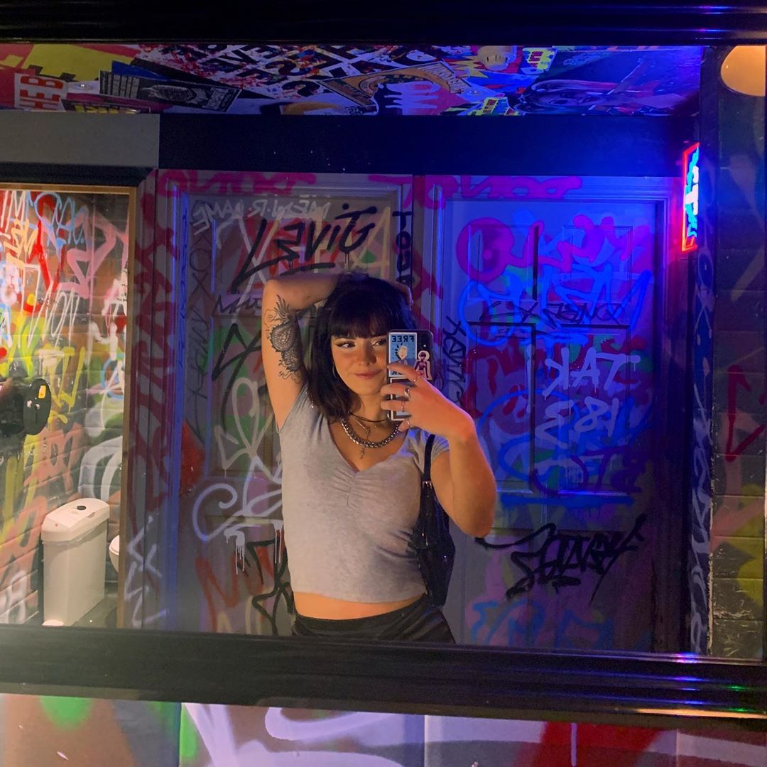 Image may contain: Arcade Game Machine, Person, Human
