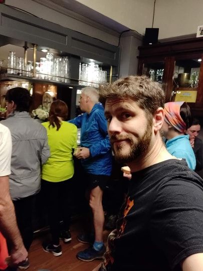 Image may contain: Beard, People, Bar Counter, Pub, Apparel, Clothing, Face, Human, Person