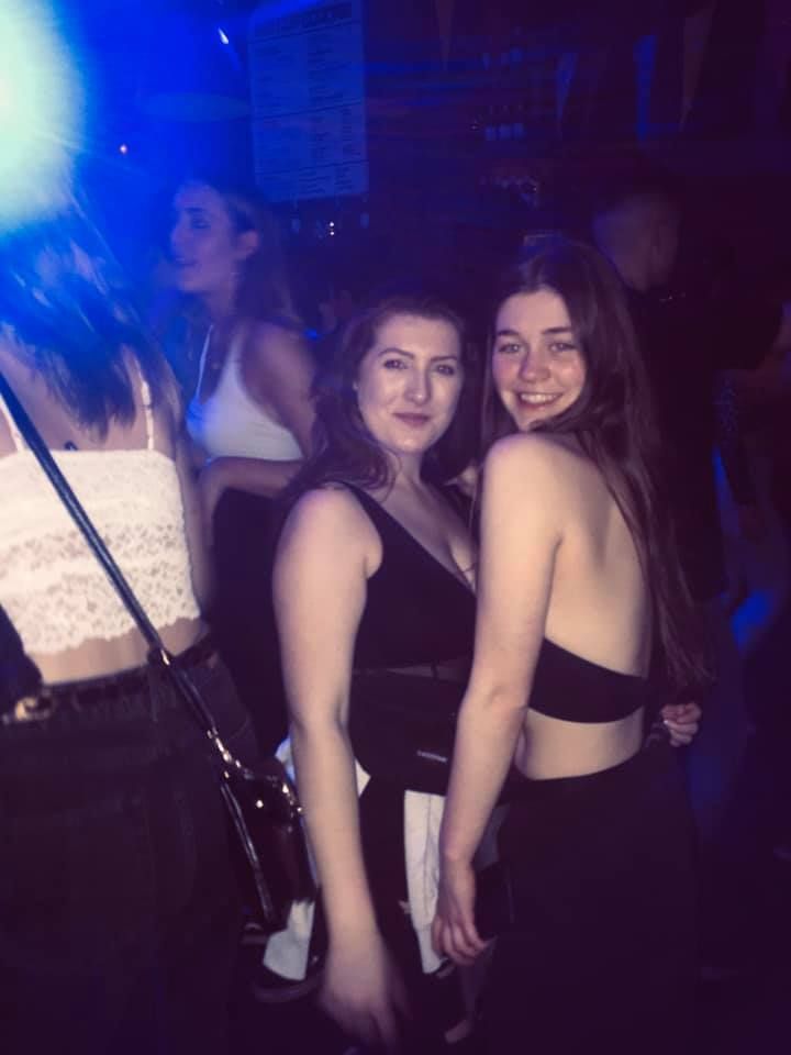 Image may contain: Night Life, Night Club, Club, Human, Person