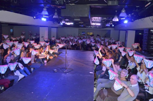 Crowd holding up their Smarty Pants