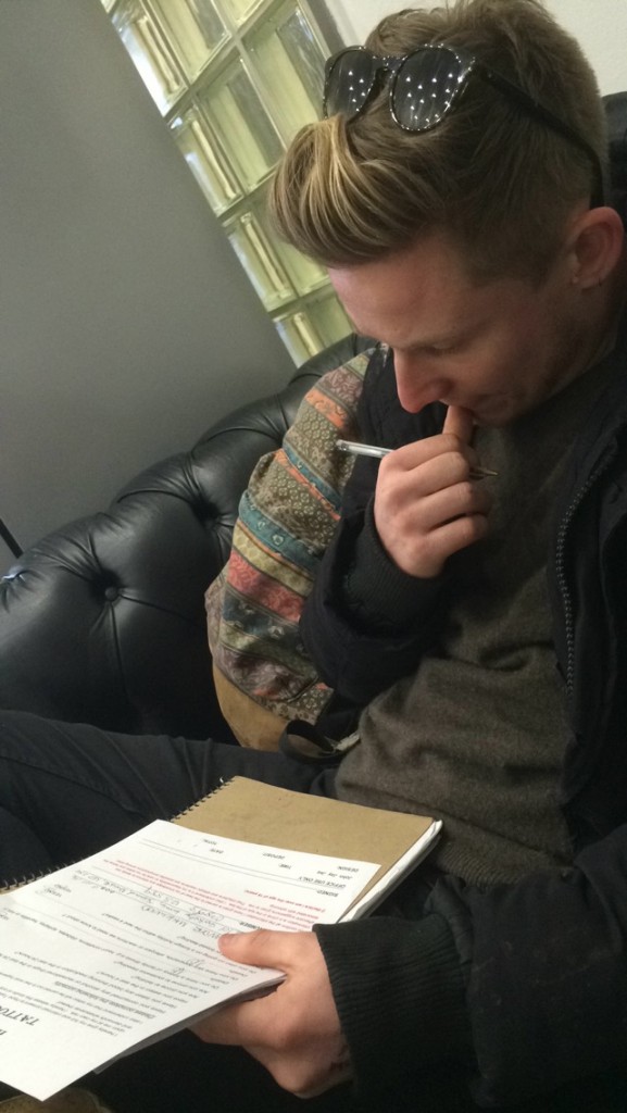Signing his life away...