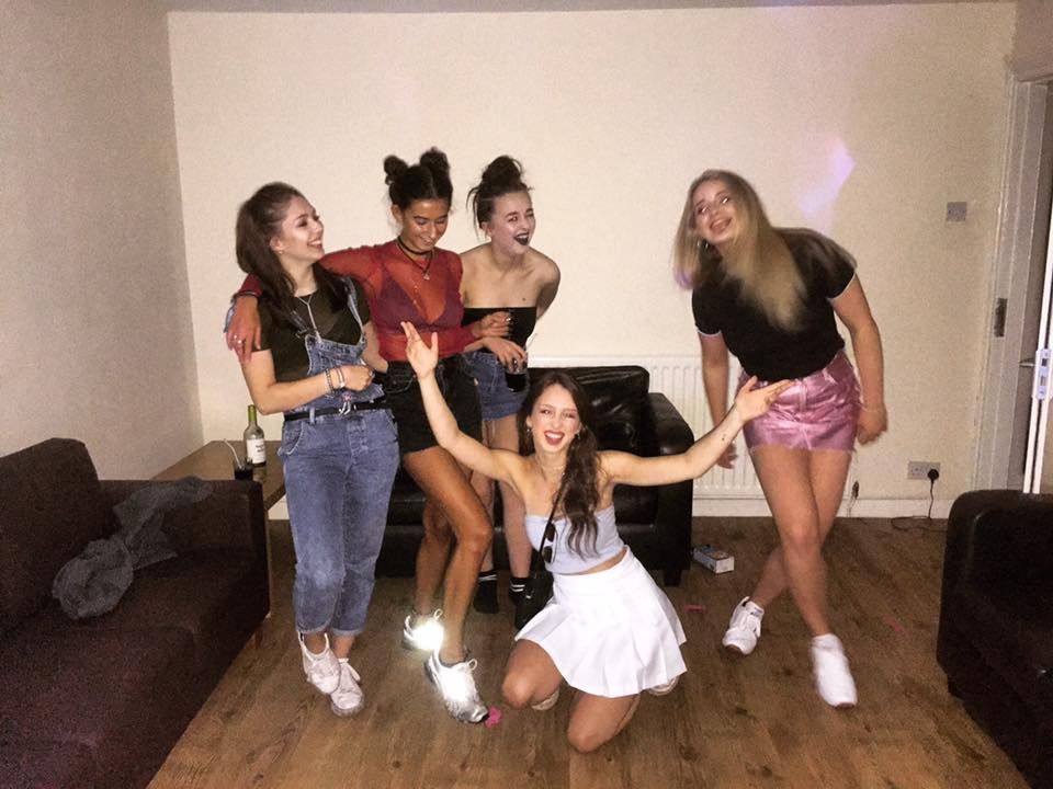 Image may contain: Party, Crowd, Furniture, Couch, Human, Person, People
