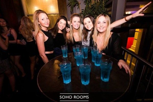 Image may contain: Party, Night Life, Night Club, Club, Drink, Beverage, Alcohol, Bottle, Person, People, Human
