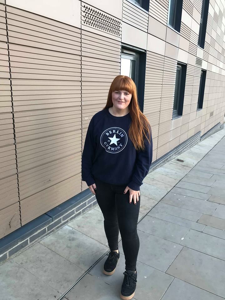 Image may contain: Sweatshirt, Sweater, Clothing, Person, People, Human