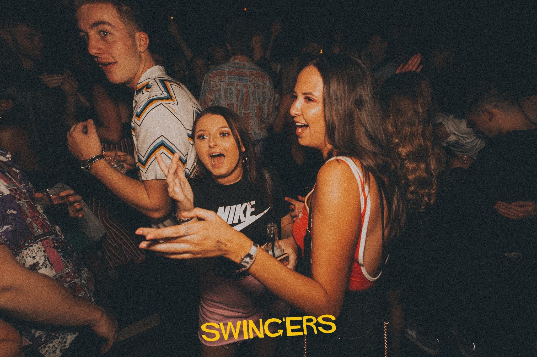 Image may contain: Night Life, Night Club, Club, Make Out, Person, People, Human