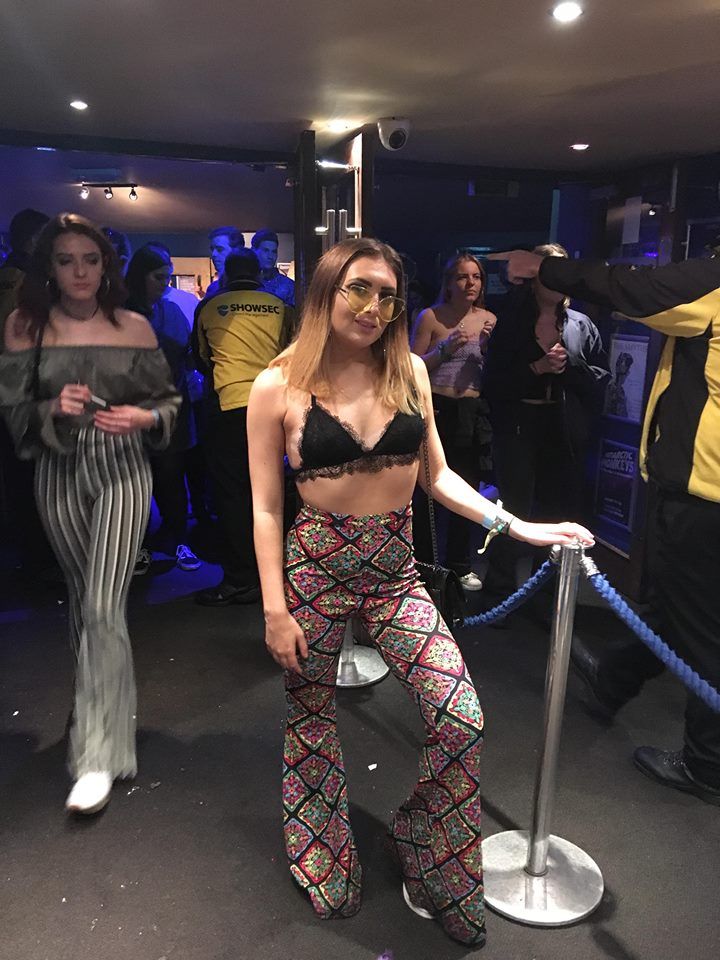 Image may contain: Night Life, Person, People, Human