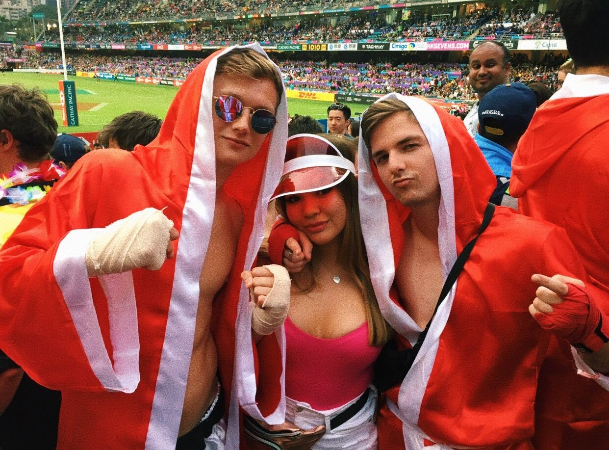 Image may contain: Parade, Crowd, Team Sport, Team, Sports, Sport, Softball, Building, Baseball Field, Baseball, Arena, Person, People, Human