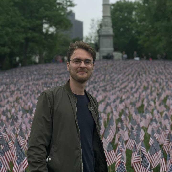 Image may contain: Clothing, Apparel, Field, Flag, Symbol, Blossom, Flower, Plant, Human, Person