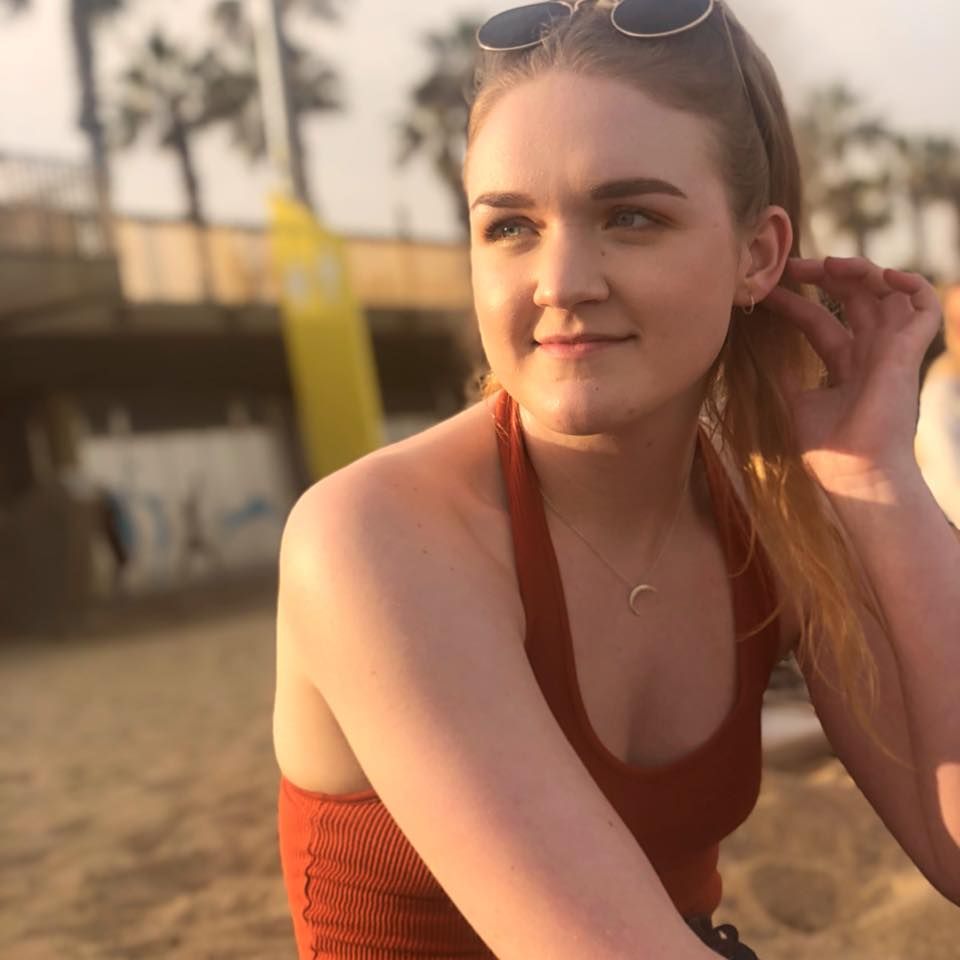 Image may contain: Water, Blonde, Woman, Kid, Girl, Child, Teen, Face, Finger, Swimwear, Female, Accessory, Sunglasses, Accessories, Apparel, Clothing, Human, Person