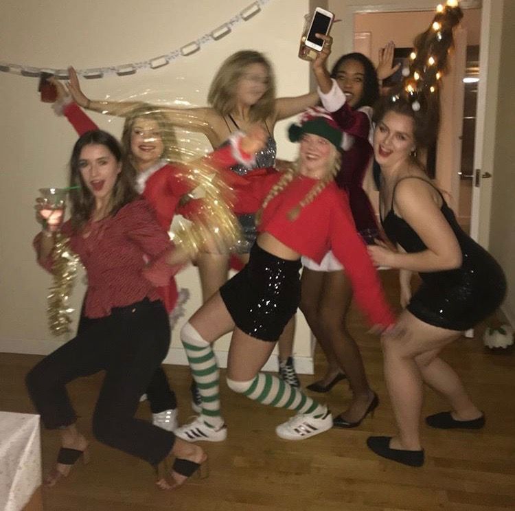 Image may contain: Face, Furniture, Chair, Female, Costume, Shoe, Footwear, Dance Pose, Leisure Activities, Apparel, Clothing, Person, Human