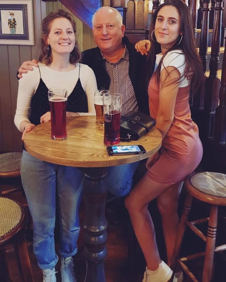 Image may contain: Lager, Female, Dining Table, Beer Glass, Table, Alcohol, Beer, Shoe, Clothing, Footwear, Apparel, Bar Stool, Bar Counter, Glass, Drink, Beverage, Pub, Person, Human, Furniture