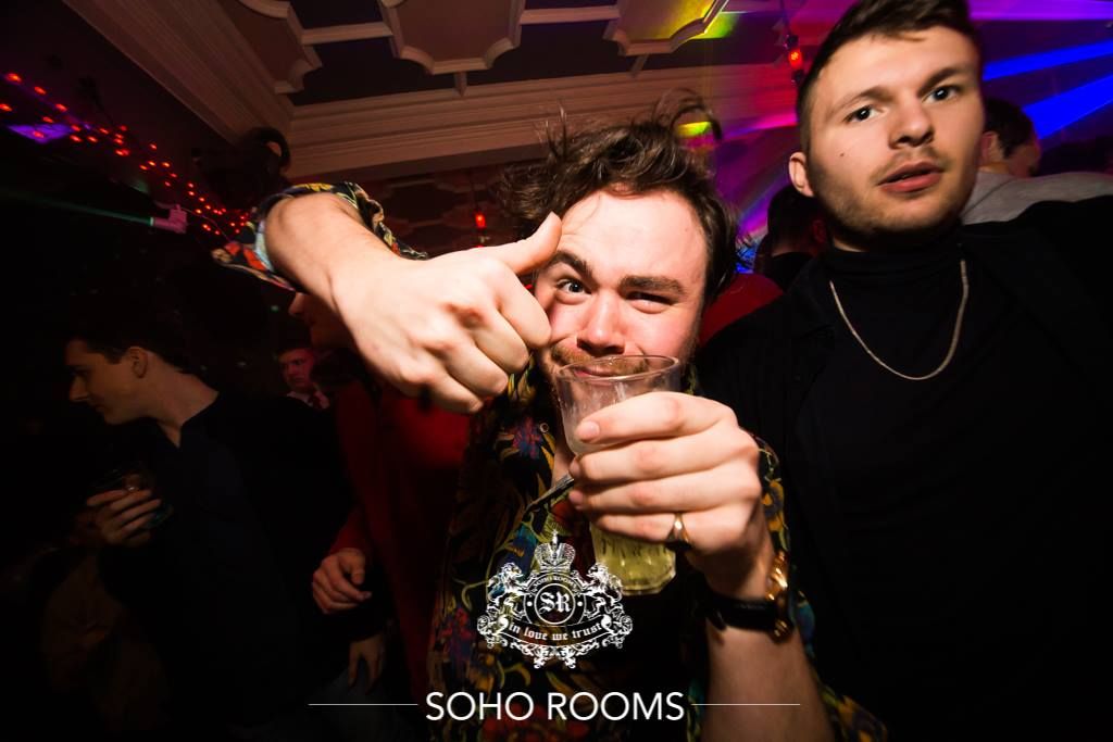 Image may contain: Drink, Beverage, Club, Night Club, Party, Human, Person
