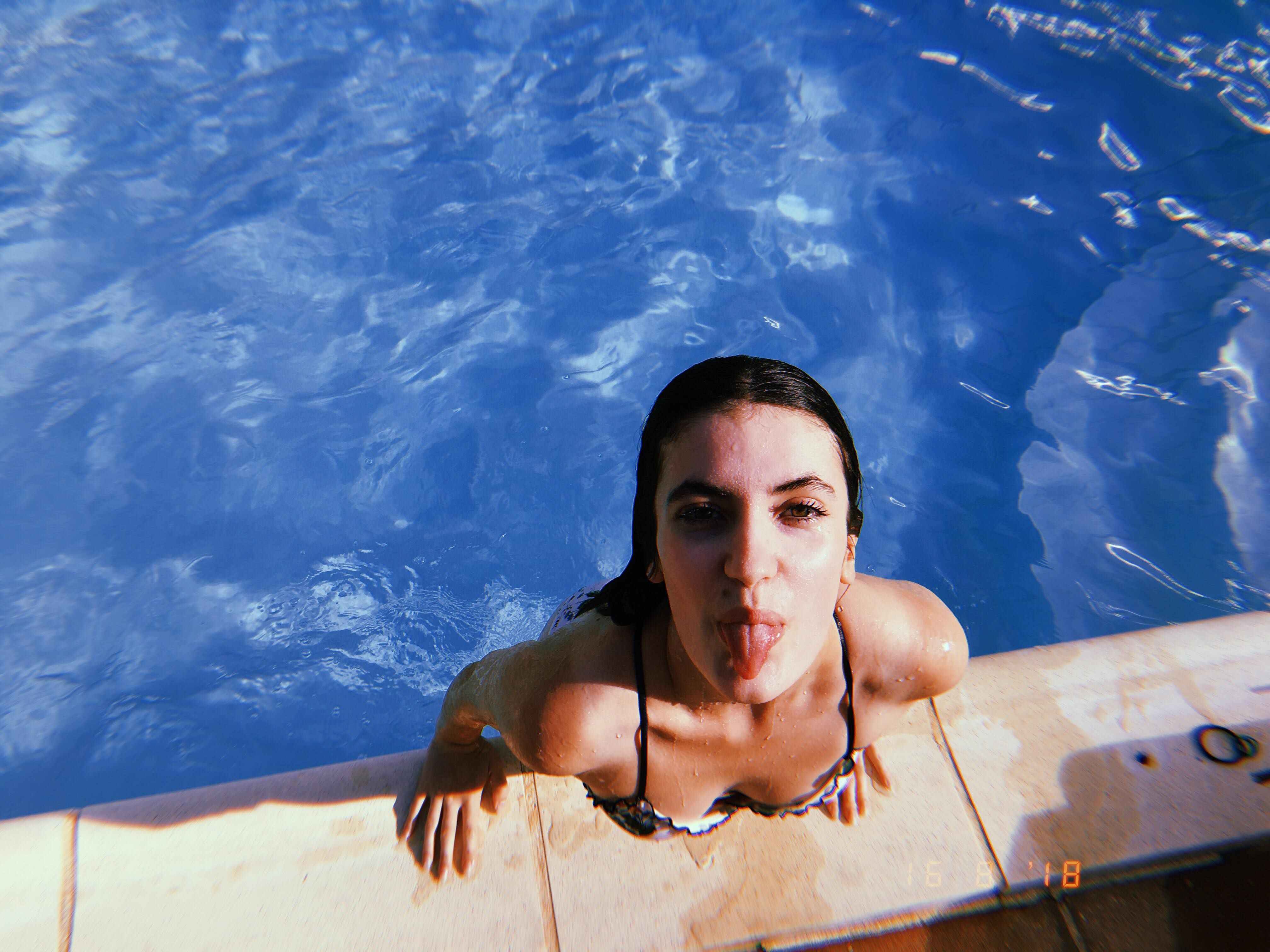 Image may contain: Finger, Face, Swimming Pool, Person, Human, Pool, Water