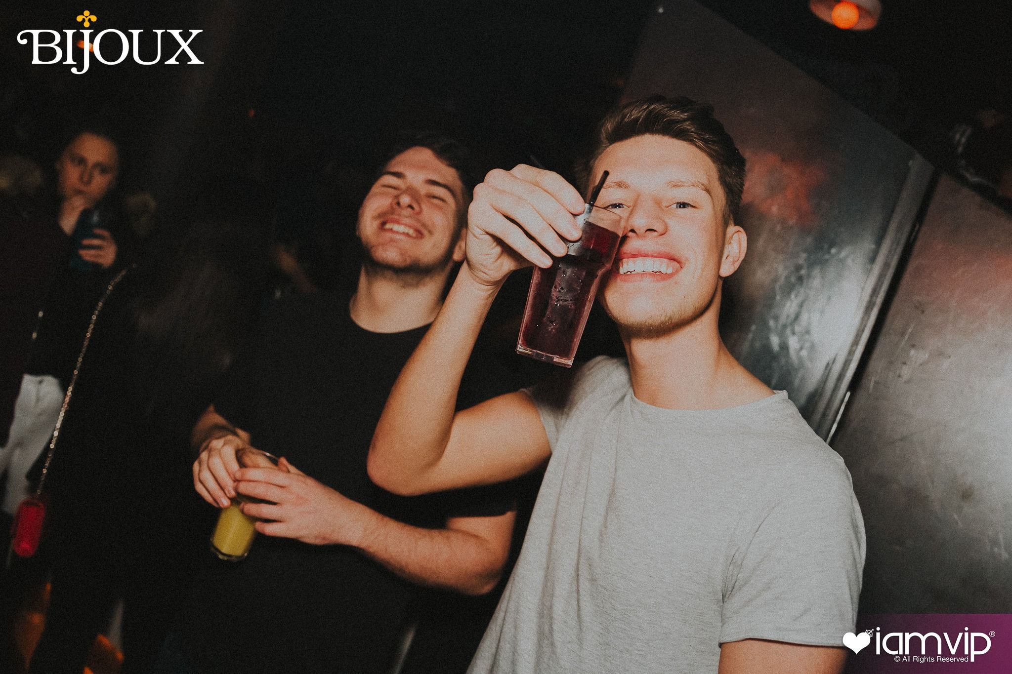 Image may contain: Finger, Pub, Beverage, Drink, Night Life, Night Club, Club, Human, Person