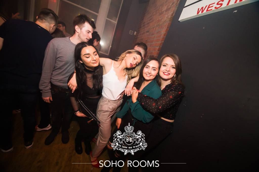 Image may contain: People, Dress, Apparel, Clothing, Night Club, Face, Club, Human, Person, Party