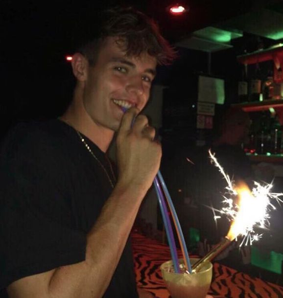Image may contain: Drink, Beverage, Pub, Bar Counter, Flame, Fire, Bonfire, Night Life, Night Club, Club, Person, Human