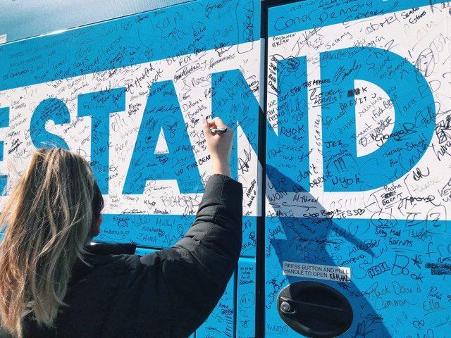 Image may contain: Hair, Head, Label, Advertisement, Sleeve, Graffiti, Art, Female, Wall, Text, Clothing, Apparel, Human, Person