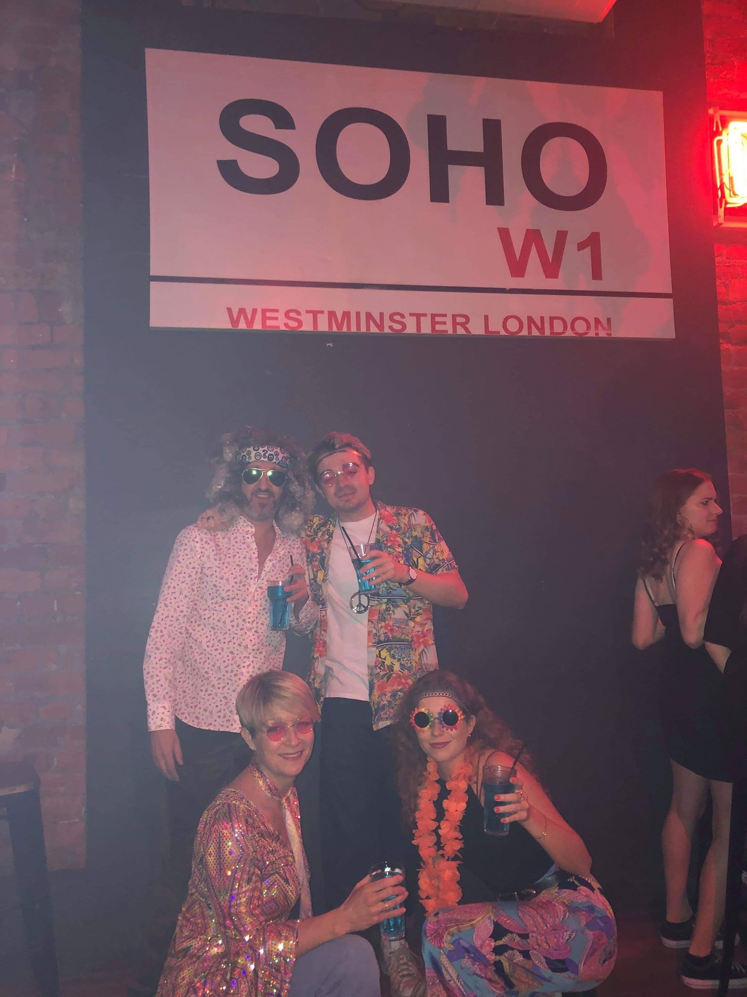 Image may contain: Poster, Advertisement, Night Life, Face, Club, Clothing, Apparel, Accessories, Accessory, Sunglasses, Human, Person