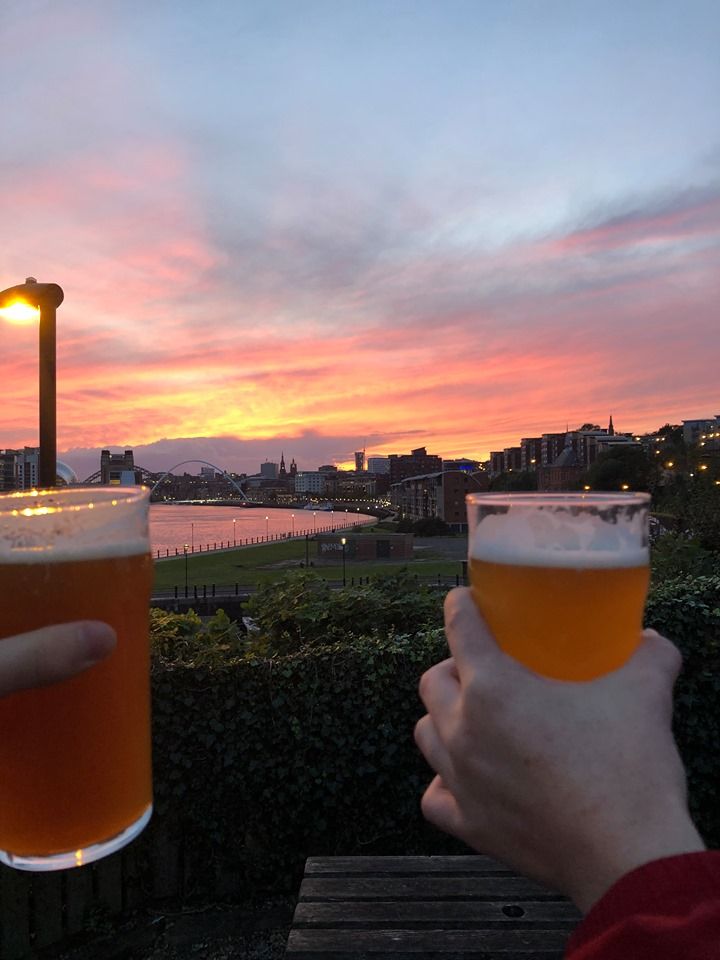 Image may contain: Cocktail, Building, Nature, Outdoors, Person, Human, Lager, Beer Glass, Glass, Beer, Drink, Beverage, Alcohol