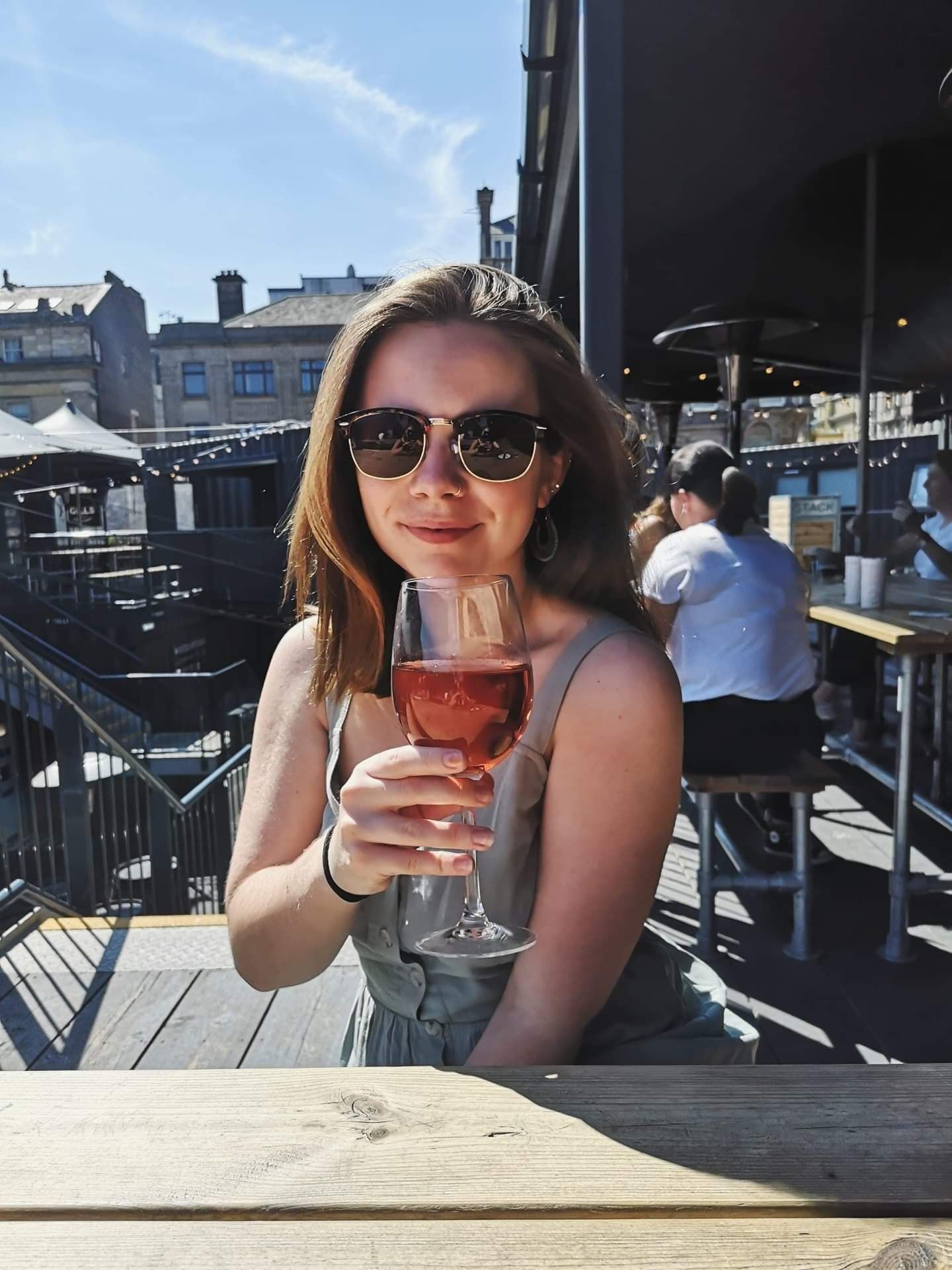 Image may contain: Food Court, Food, Beverage, Drink, Dating, Restaurant, Glass, Sitting, Human, Person, Accessories, Sunglasses, Accessory