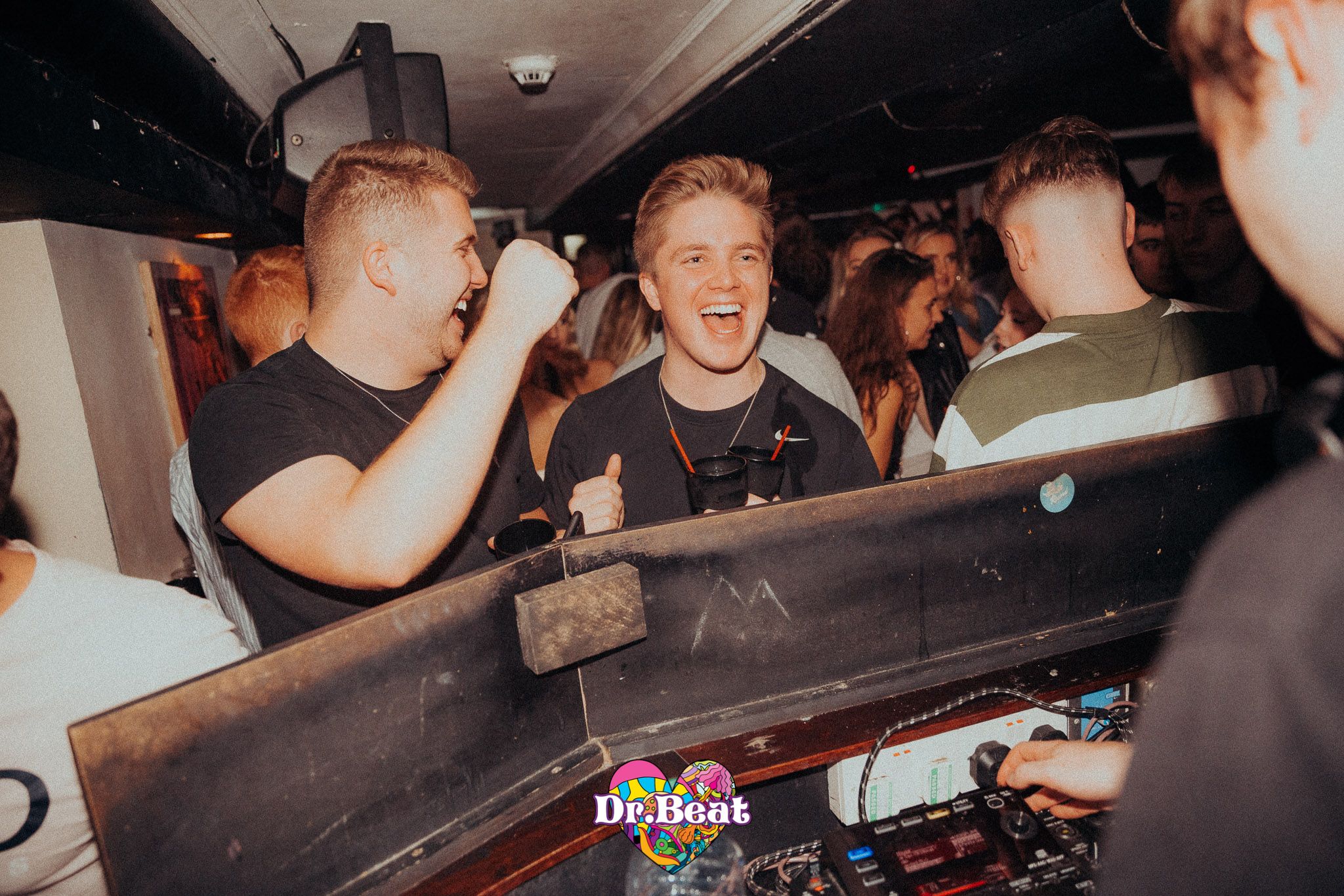 Image may contain: Night Life, Bar Counter, Pub, Dj, Night Club, Club, Human, Person