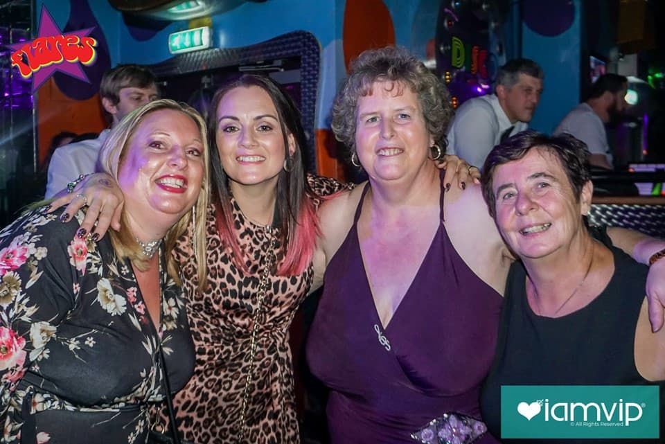 Image may contain: People, Face, Night Club, Club, Party, Human, Person