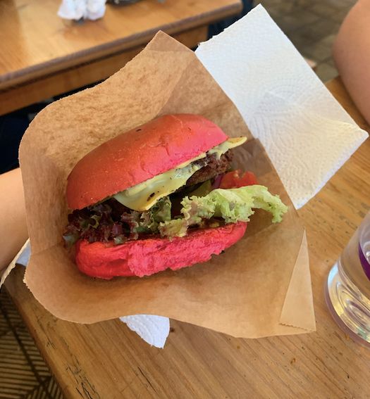 Image may contain: Person, Human, Burger, Food
