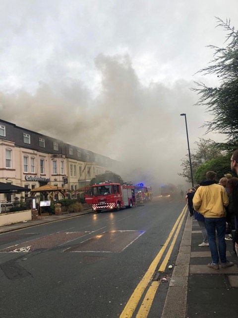Image may contain: Smoke, Road, Nature, Bus, Vehicle, Transportation, Person, Human