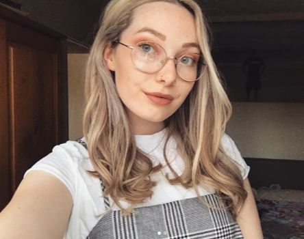Image may contain: Glasses, Accessories, Accessory, Photo, Portrait, Photography, Kid, Blonde, Child, Teen, Woman, Girl, Smile, Female, Face, Person, Human