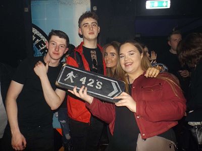 Image may contain: Leisure Activities, Night Club, Skin, Night Life, Club, Face, Party, Person, Human